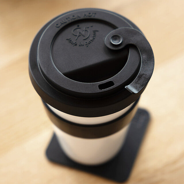 TO-GO-CUP silwy porcelain 1 cup+1 pad+1 lid col. white incl. coaster BLACK